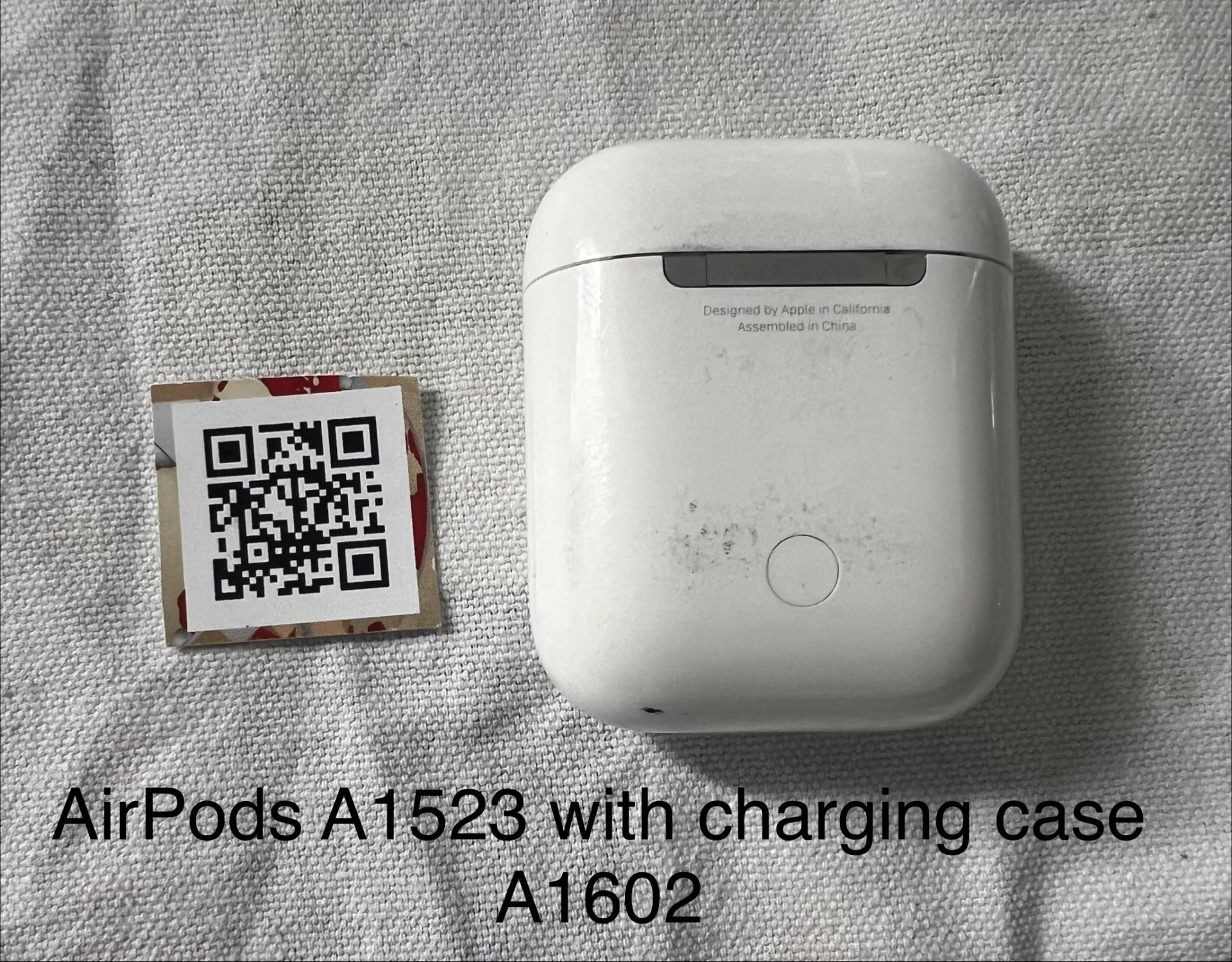 Second-hand Genuine Apple AirPods A1523 with charging Case A1602 tested on IPhone 13 with IOS 26.6.1